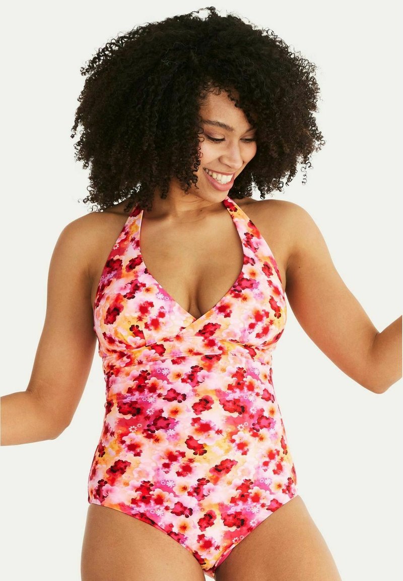 Baddräkt i blommönster med rosa, röd och orange nyanser. Halterneck-design med v-formad halsringning och rynkad bröstparti.