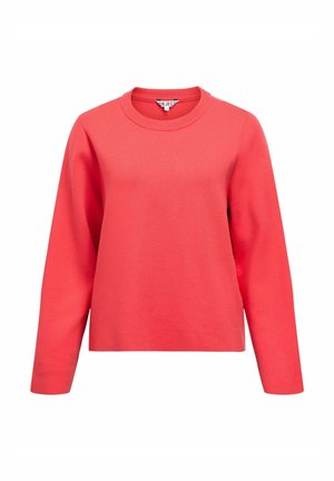 Koralowy sweter z długim rękawem i okrągłym dekoltem, wykonany z miękkiego materiału. Charakteryzuje się luźnym krojem i prostym designem, bez widocznych wzorów czy zdobień.