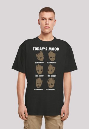 Black T-shirt featuring a graphic with six Groot character expressions, and the text "TODAY'S MOOD" and "I AM GROOT" in white.