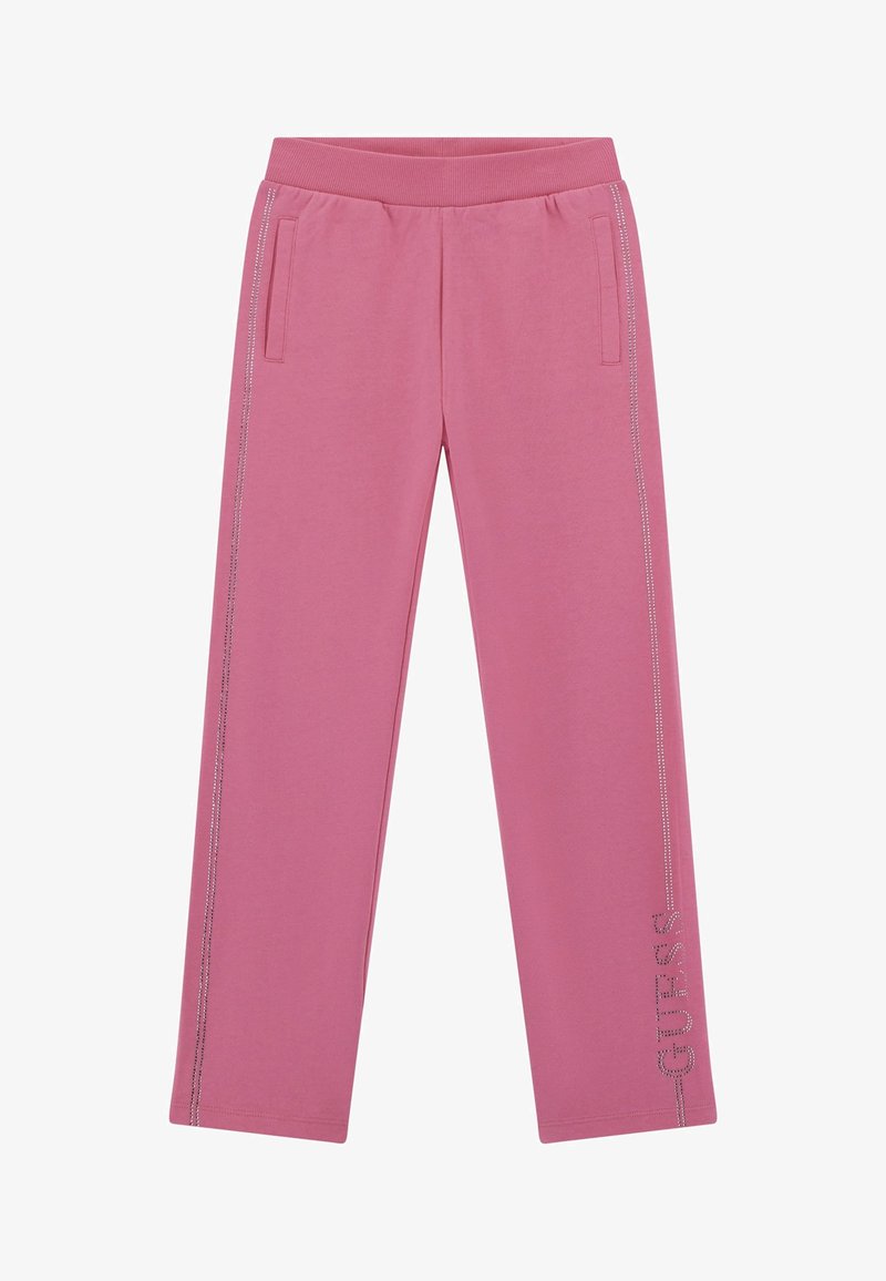 Rosa Baumwollsweatpants mit einem gerippten Bund, Seitentaschen und metallischen Verzierungen am linken Bein, die den Markennamen "GUESS" anzeigen.
