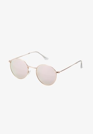 Lunettes de soleil rondes avec une fine monture en métal rose doré et des verres roses. Elles présentent des branches courbées et un design minimaliste.