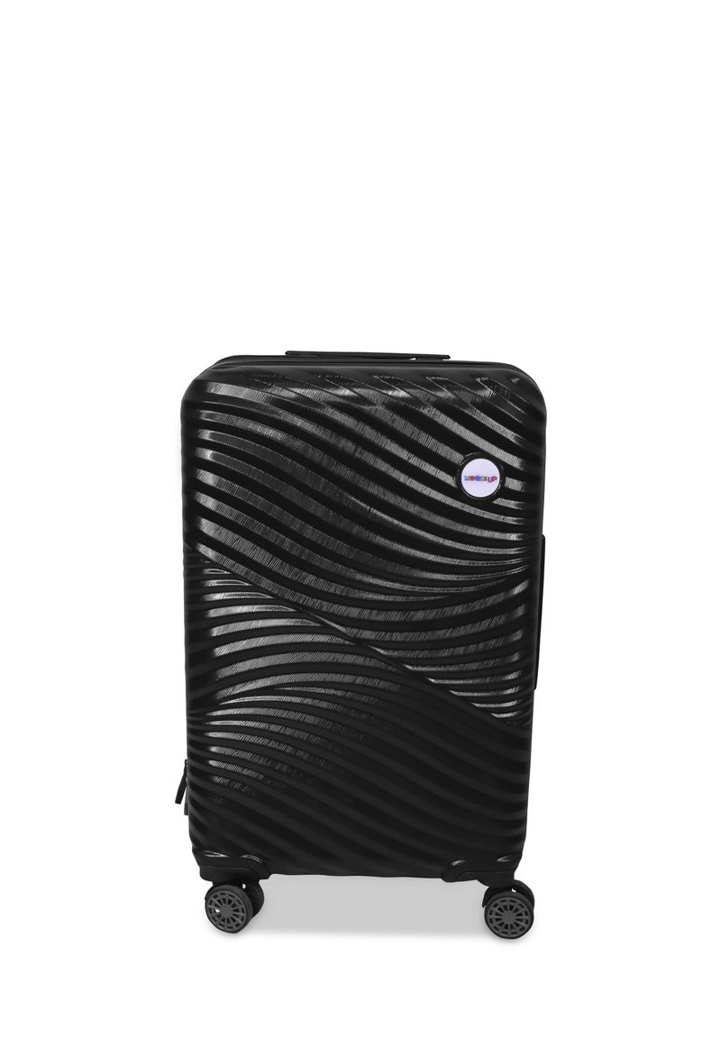 Black suitcase with a wave-patterned textured surface, telescoping handle, four wheels, and a small circular logo on the front.