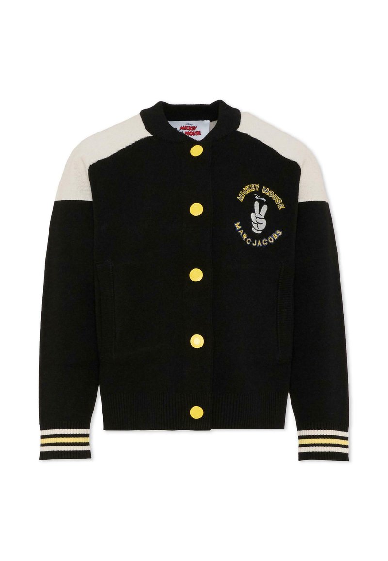 Pull noir avec des boutons jaunes, design de panneaux blancs et noirs, poignets côtelés et broderie "Mickey Mouse" avec un signe de paix.