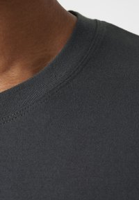 Helly Hansen NORD GRAPHIC - Camiseta estampada - ebony