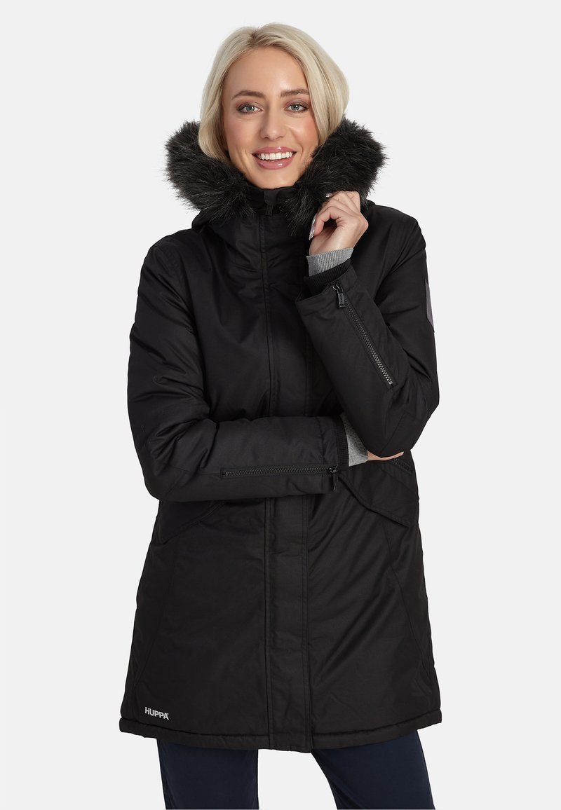 Czarna, ocieplana kurtka z odpinanym kapturem wyłożonym futrem, zapinanymi kieszeniami i luźnym krojem. Gładka faktura z minimalistycznymi akcentami w designie.