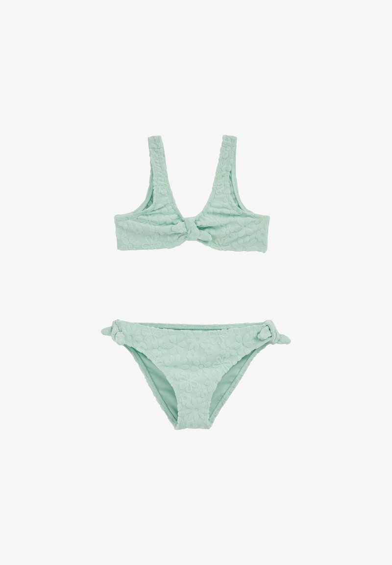 Ensemble bikini vert menthe avec un motif floral texturé, présentant un détail noué sur le haut et des liens sur les côtés du bas.