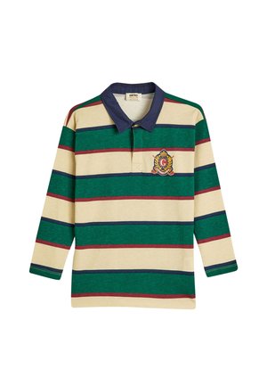 Langsleeve polo shirt met groene, marineblauwe en bordeauxrode strepen op een crème achtergrond. Heeft een marineblauwe kraag en een wapenembleem op de borst.
