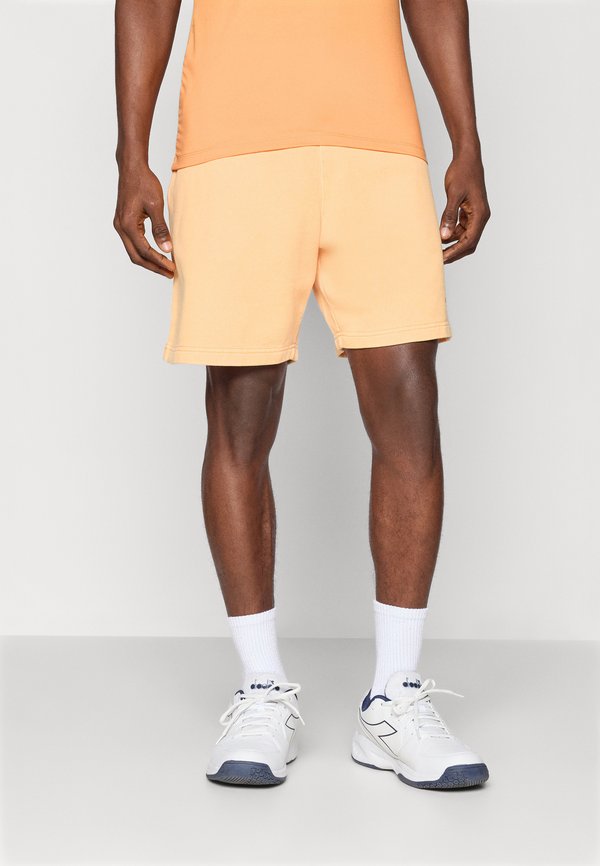 WASHED SWEATSHORTS - Sports shorts - papaya