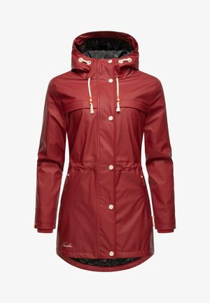 Red waterproof jacket with a hood, two chest pockets, drawstring accents, and a zipper pocket. Features a contrasting black patterned lining.