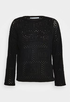 Black knitted sweater featuring a geometric pattern with open weaves. Long sleeves and a round neckline complete the design.