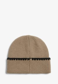 Beige knitted hat with ribbed texture, featuring a black scalloped accent band. Simple, rounded design for warmth and comfort.