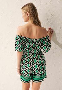 Next OFF SHOULDER REGULAR FIT - Overall / Jumpsuit - green geometric