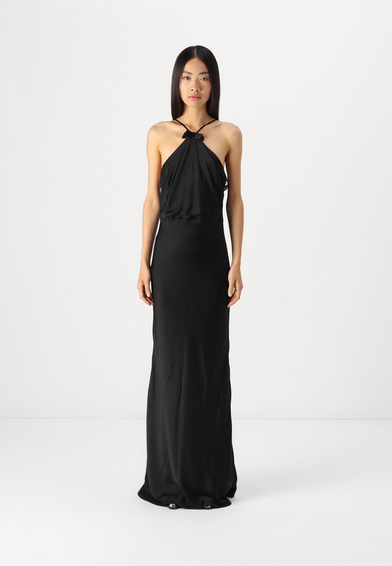 Black satin evening gown with halter neck, gathered bodice, fitted silhouette, and subtle draping to the floor. No visible patterns or hardware.