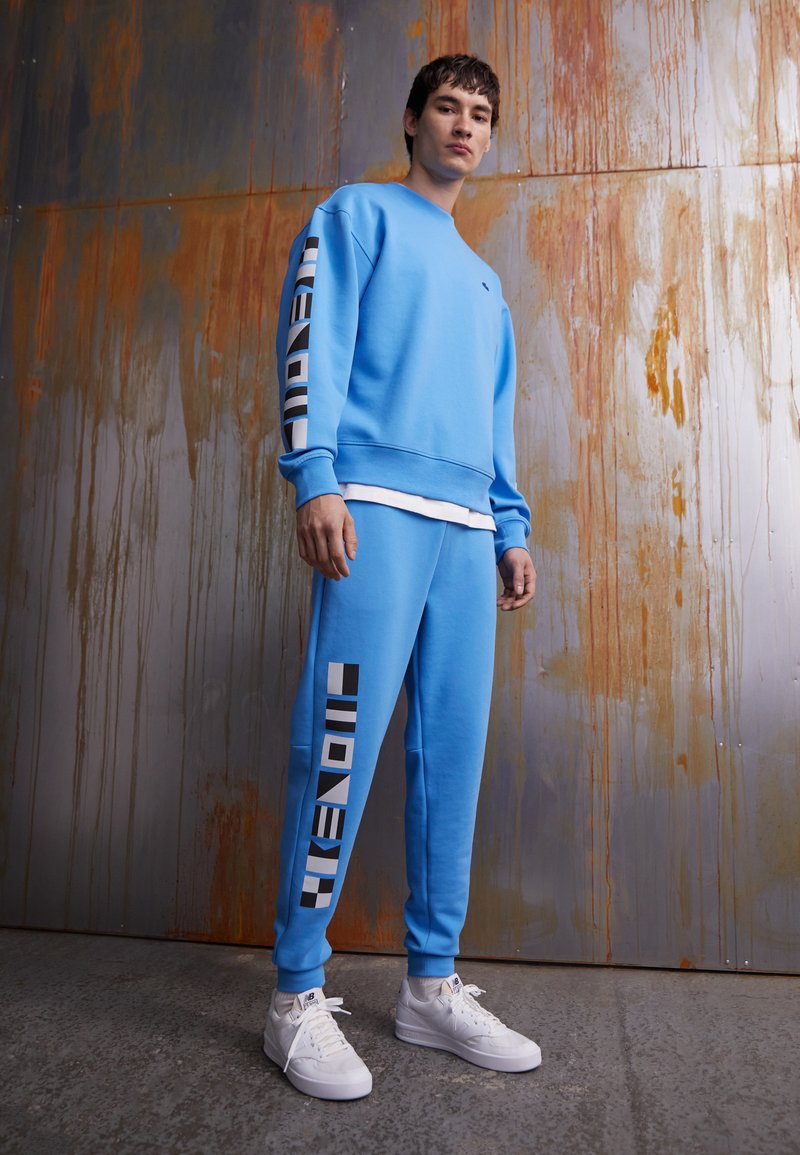 Lacoste Tracksuit bottoms argentine/light blue Zalando.ie