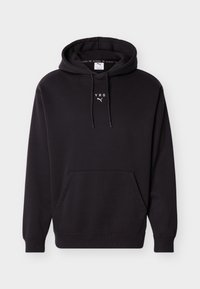Sweat à capuche noir avec poche kangourou à l'avant et logos "HYROX" et Puma en blanc sur la poitrine.
