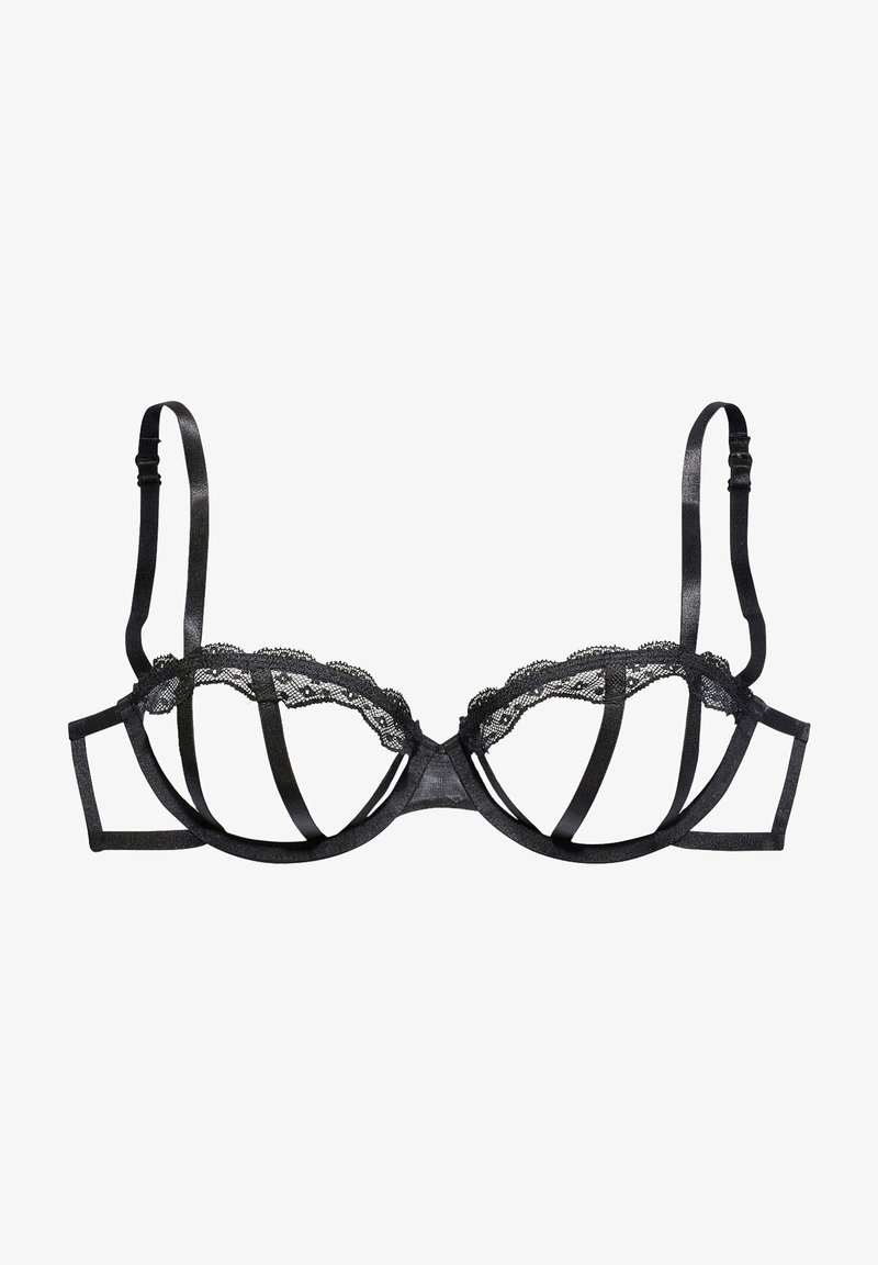 Schwarzer BH mit Spitzenbesatz, dünnen verstellbaren Trägern und geometrischen Ausschnitten in einem halbtransparente Design. Das Material ist glatt mit einem dezenten Glanz.