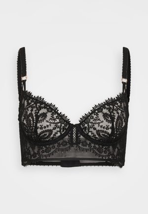 Soutien-gorge en dentelle noire avec un mesh transparent, broderie florale décorative, bords festonnés, bretelles réglables et fermeture à crochets dans le dos.