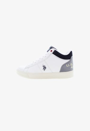 White sneaker with a smooth leather upper, navy blue and gray suede accents on the heel, and a logo printed on the side. Textured rubber sole.