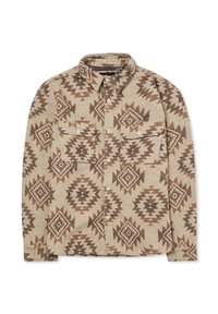 Koszula w odcieniach brązu z wzorem w geometriczne kształty, wykonana z tkaniny tkanej. Dwie kieszenie na piersi z zapięciem na guziki.