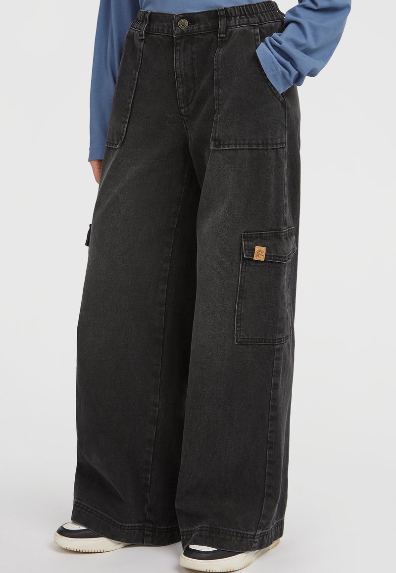 Black wide-leg cargo pants made of sturdy denim. Features multiple pockets, including a side pocket, and a visible brand tab.