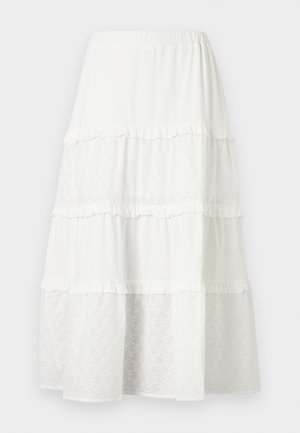 Jupe midi blanche à volants avec panneaux alternés unis et en dentelle à œillets, avec un léger volant aux coutures.