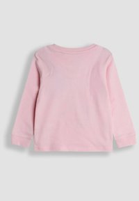 Pitkähihainen paita pehmeästä vaaleanpunaisesta puuvillasta. Ominaisuuksiin kuuluu pyöreä pääntie, istuvatikut ja yksinkertainen muotoilu ilman kuvioita tai koristeluja.