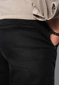 Ombre CARROT FIT - Jeans slim fit - black