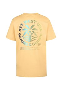 Gul bomulds T-shirt med et trykt design med palmer og tekst: "Key West USA Gators & Cudas" i blå og grøn. Korte ærmer.