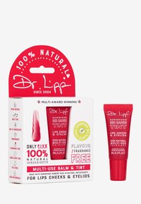 Red packaging displays "100% Natural" and product name. Contains a 8ml red tint tube for lips, cheeks, and eyelids. Uses sugarcane bioplastic.