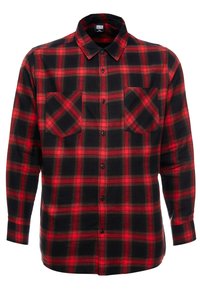 Rood-zwart geblokte flanellen shirt met lange mouwen, twee borstzakken en een knoopsluiting aan de voorkant. Zachte, gestructureerde stof met een klassiek patroon.