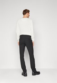 BOSS SLIM - Hlače chino - black