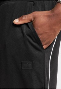 Alpha Industries JOGGER - Pantalones deportivos - black