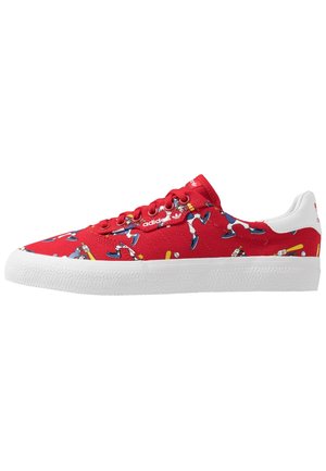 Red canvas sneakers featuring cartoon baseball players, white rubber sole, and round laces. Intricate design with colorful accents throughout.