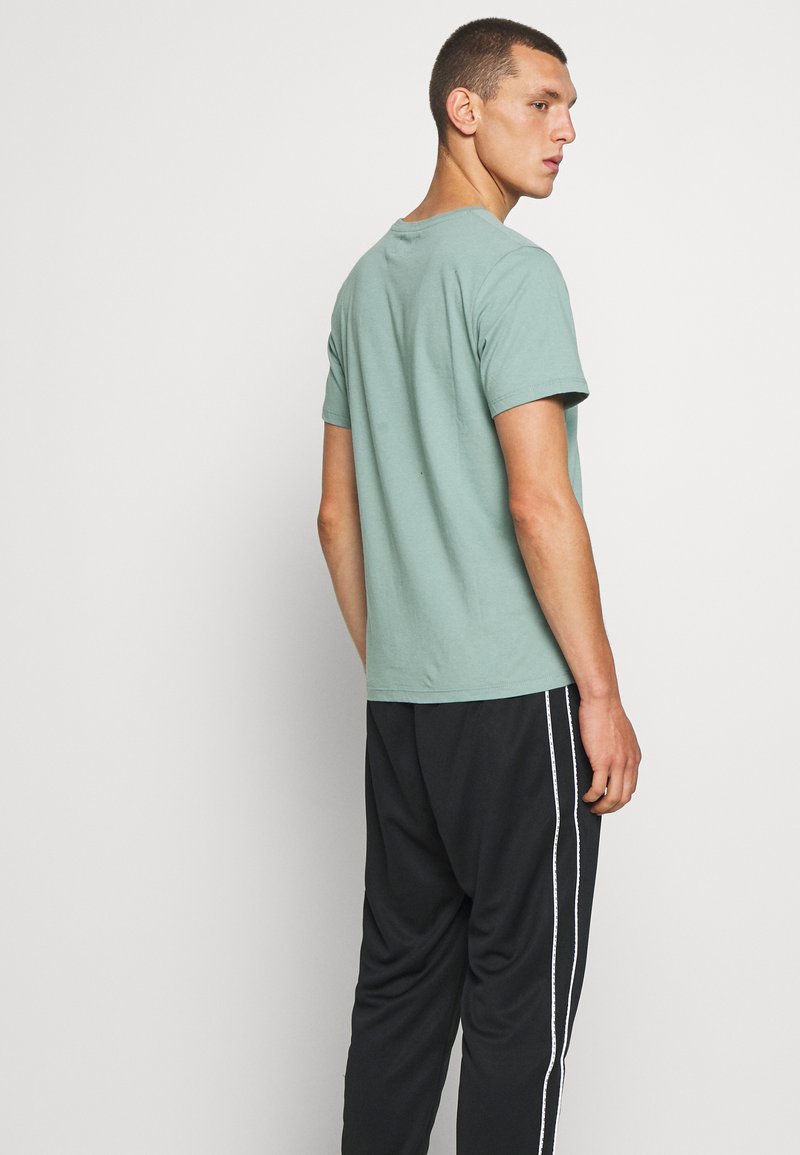 Nike Sportswear Repeat Pantalon De Survetement Black Noir Zalando Be Nike Sportswear Repeat Pantalon De Survetement Black Noir Zalando Be