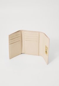 Light beige leather wallet with a smooth texture, featuring multiple card slots, a gold clasp closure, and minimal branding on the interior.