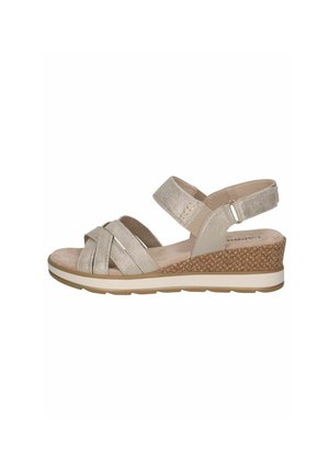 Strappy, metallic beige sandals with a wedge heel. Textured, cork-like material on the heel. Adjustable strap at the ankle. Soft footbed.