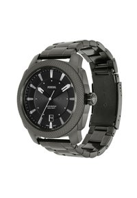 Montre en acier inoxydable noir avec une lunette texturée, un cadran noir, des index horaires blancs, un affichage de la date à 6 heures, et un bracelet à maillons.