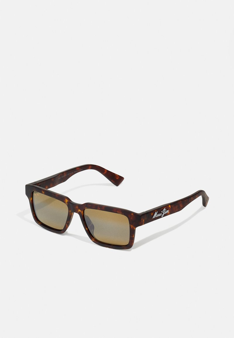 Square sunglasses with a tortoiseshell frame, brown gradient lenses, and silver logo on the arm. Textured finish with sturdy design.