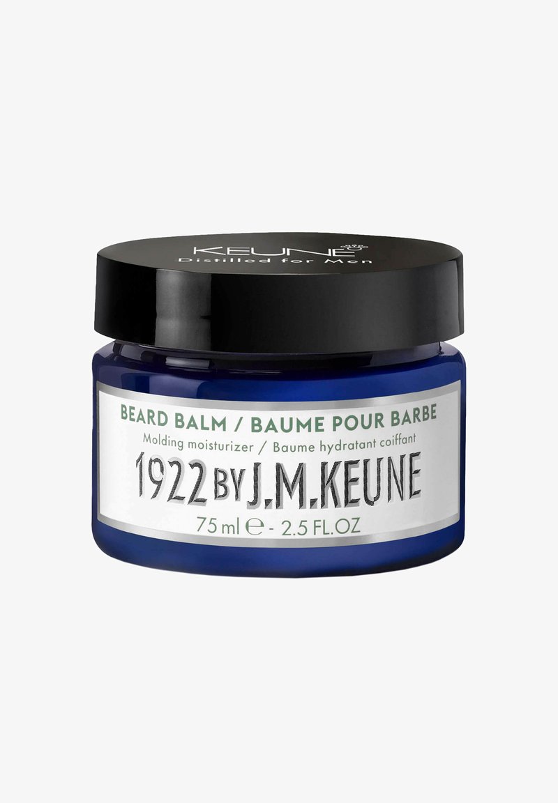 Barattolo blu navy con un coperchio nero. L'etichetta mostra "BALSAMO PER BARBA" in grassetto nero. Contiene 75 ml, adatto per idratare e modellare le barbe.