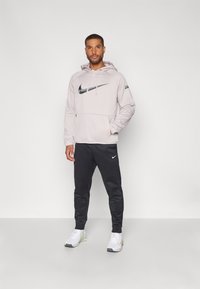 Nike Performance HOODIE - Jersey con capucha - platinum violet/black