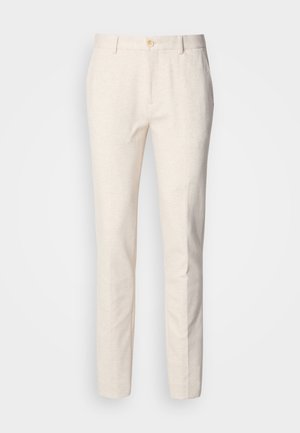 Light beige, tailored trousers made from soft fabric. Features a button closure, belt loops, and a slim, straight-leg design with minimal texture.