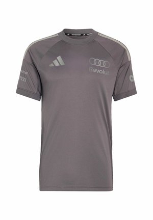 Harmaa, lyhythihainen Adidas Motorsport -paita, jossa Audi-, Revolut-, Castrol-, Pirelli- ja auringonkukka-logot edessä ja hihoissa.