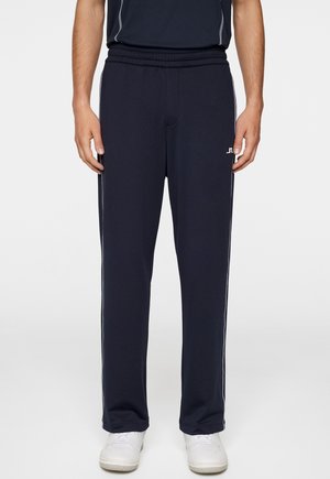 RUDI - Tracksuit bottoms - jl navy