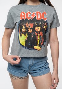 Gray cotton crop top featuring a colorful AC/DC band graphic, short sleeves, and a classic crew neckline. Front design includes multiple faces.