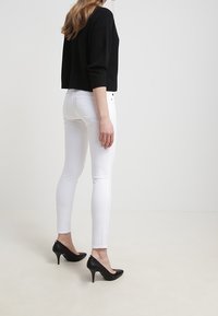 AG Jeans Vaqueros pitillo - white