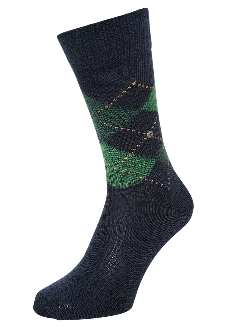 Calcetines azul marino con patrón de argyle verde, acentos de costura naranja y puño acanalado. Fabricados con un material suave y elástico para mayor comodidad.