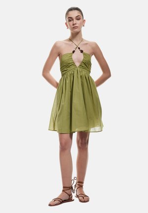 Ranta-asusteet - green