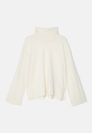 Vaalean kerma turtleneck-neule, ylisuuri malli, ribbettikuvio, laskettu hartia ja leveät hihat, valmistettu pehmeästä neuloksesta.