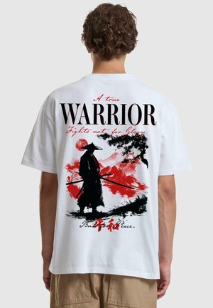 White cotton t-shirt featuring a large black and red graphic of a samurai and text reading "A true WARRIOR" and "Fights not for Glory."