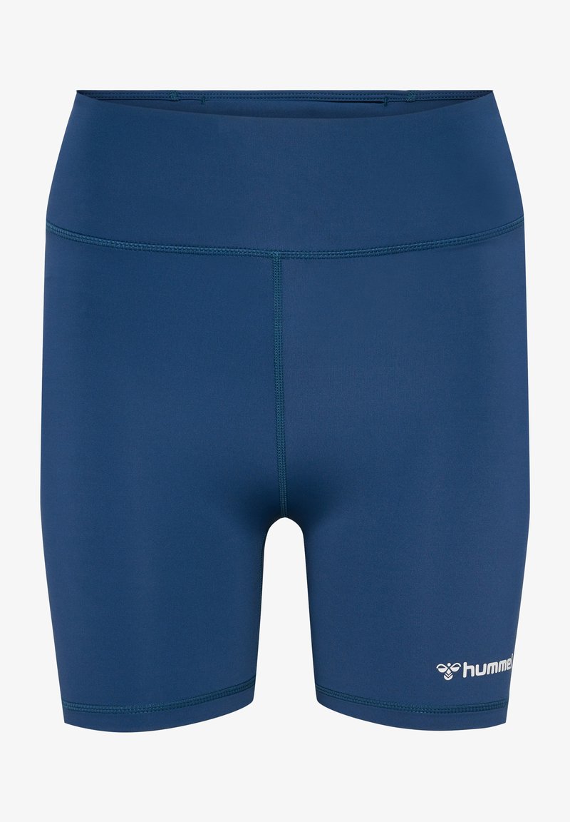 Marineblauwe sportbroekjes gemaakt van rekbaar materiaal, met vlakke naden, een hoge tailleband en een wit logo op de onderrechterzijde.